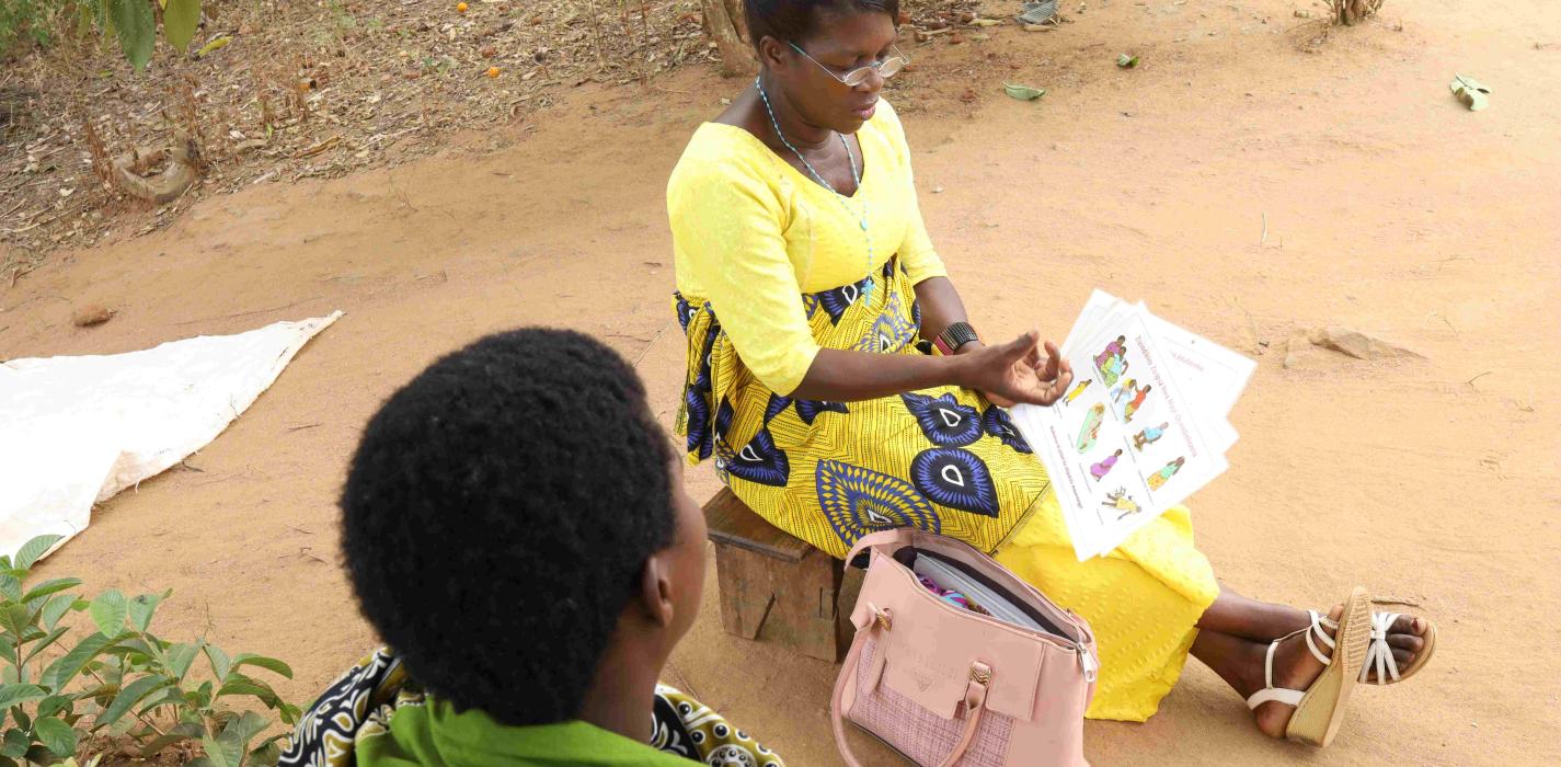 Community Health Worker Mary Brown screens a client 