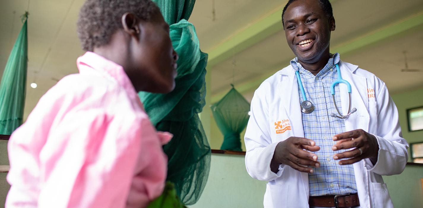 Maternal health doctor interacting with a patient.