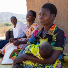 CHWs with patient and baby. 
