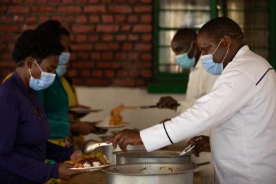 Head chef serves food 