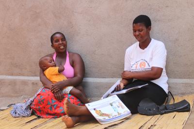 CHW talks with beneficiary